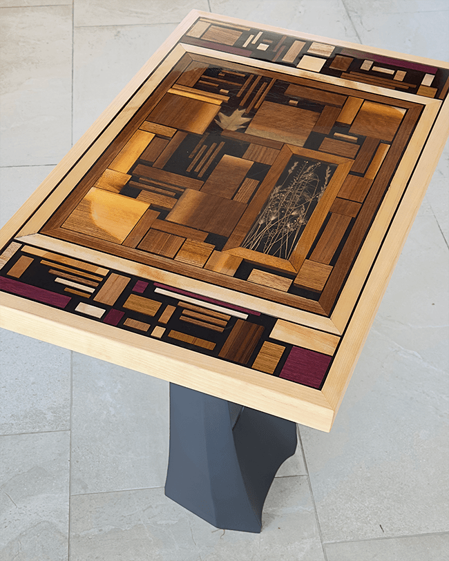 Resin table top with wood chip inlays
